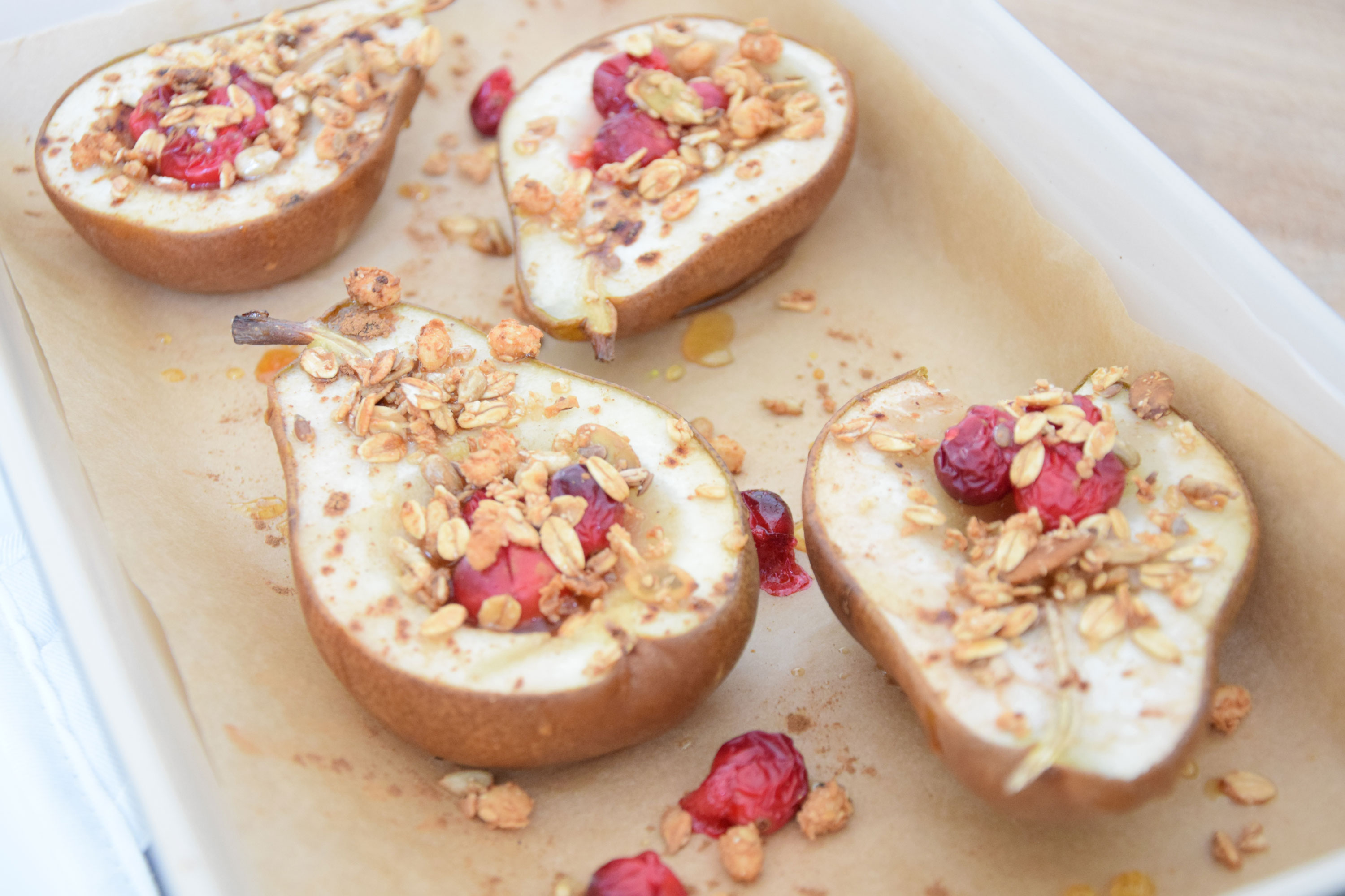 Baked pears with cranberries and XAVIES' Granola topping - XAVIES’