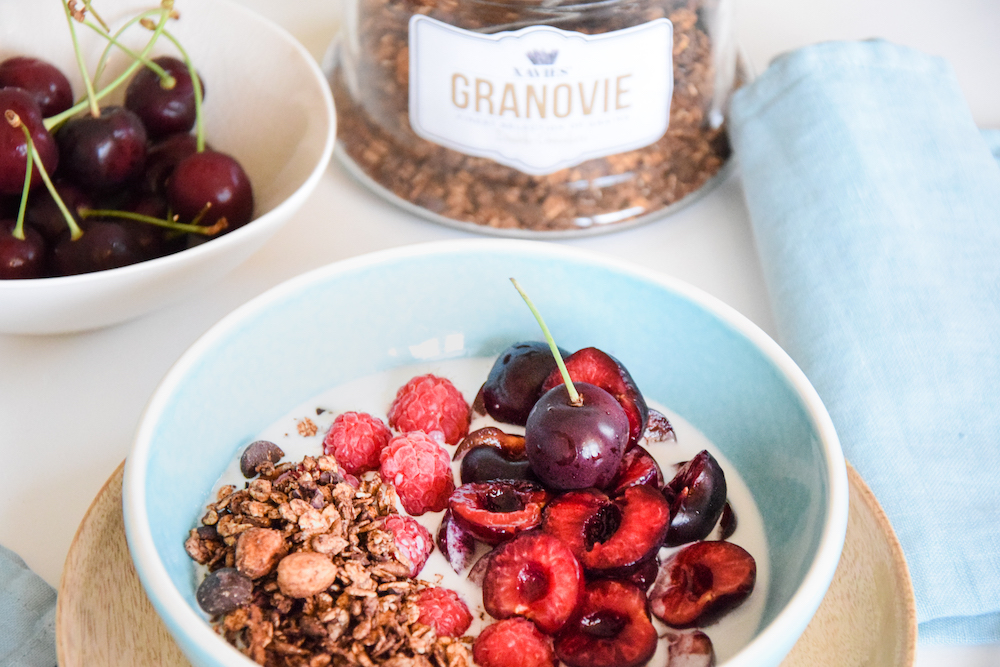 Sweet cherries with XAVIES' double chocolate granola - XAVIES’