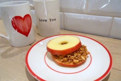 Apple sandwich with peanut butter and XAVIES' granola